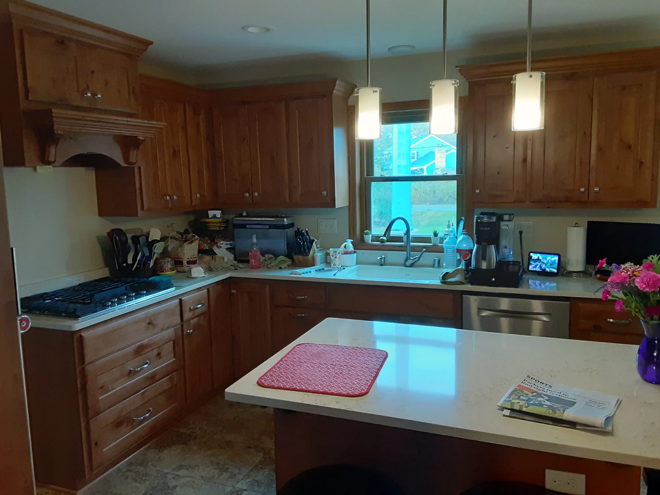 Knotty alder kitchen with cooktop