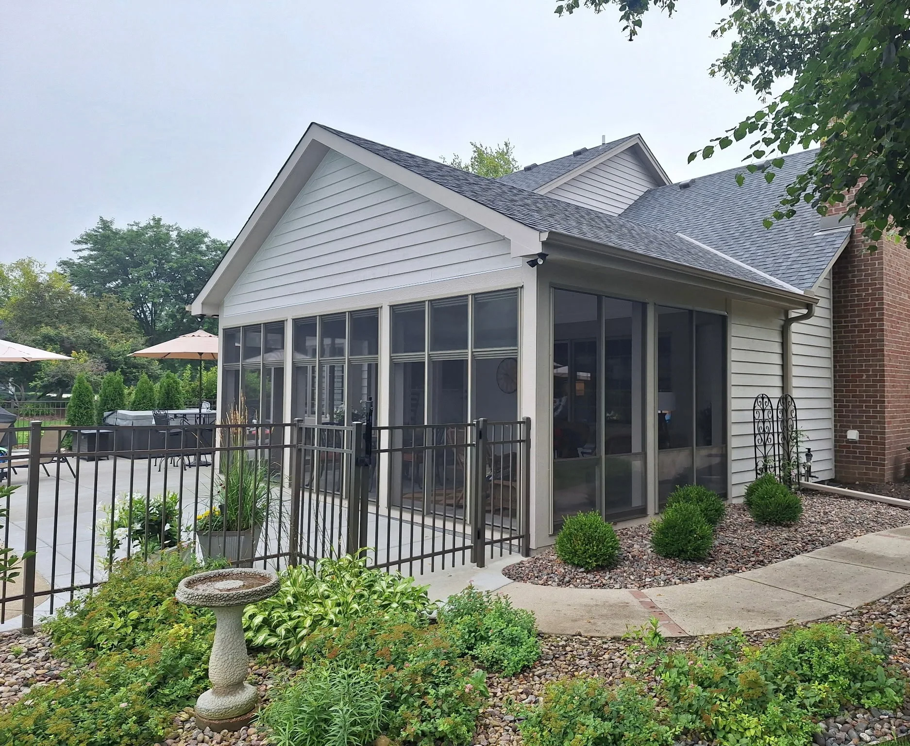 Raised screened porch with gable