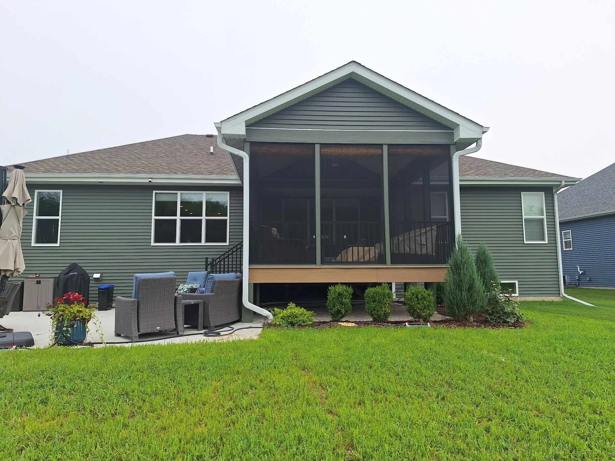 Rear view of raised screened porch