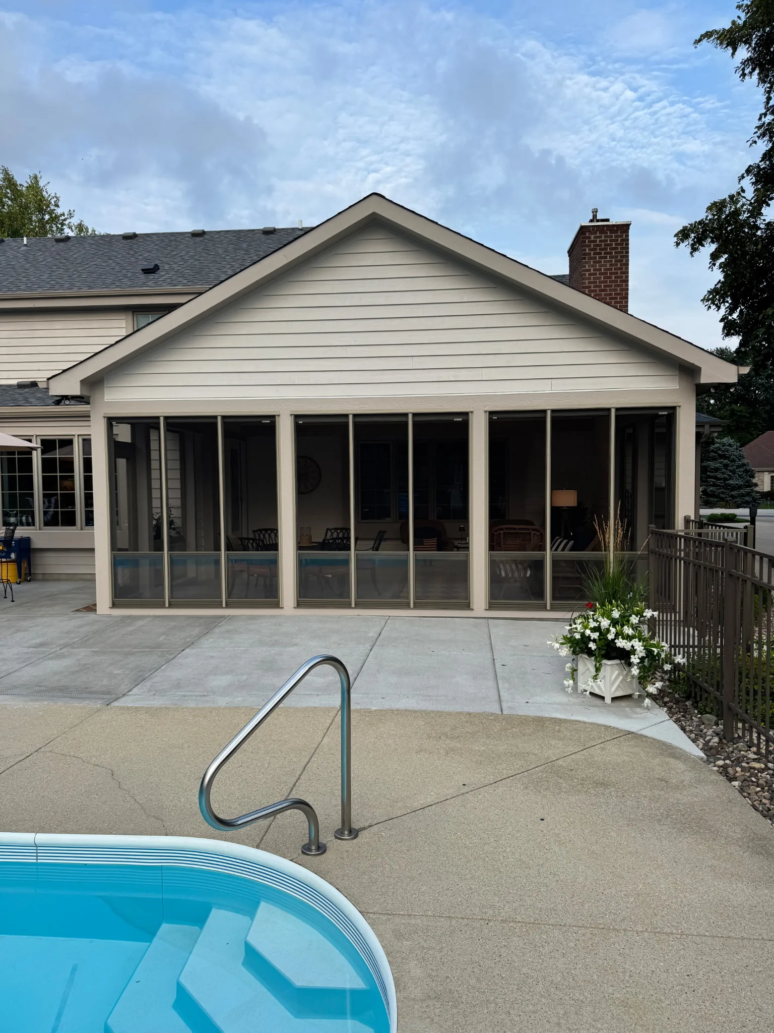 Poolside view of screened porch