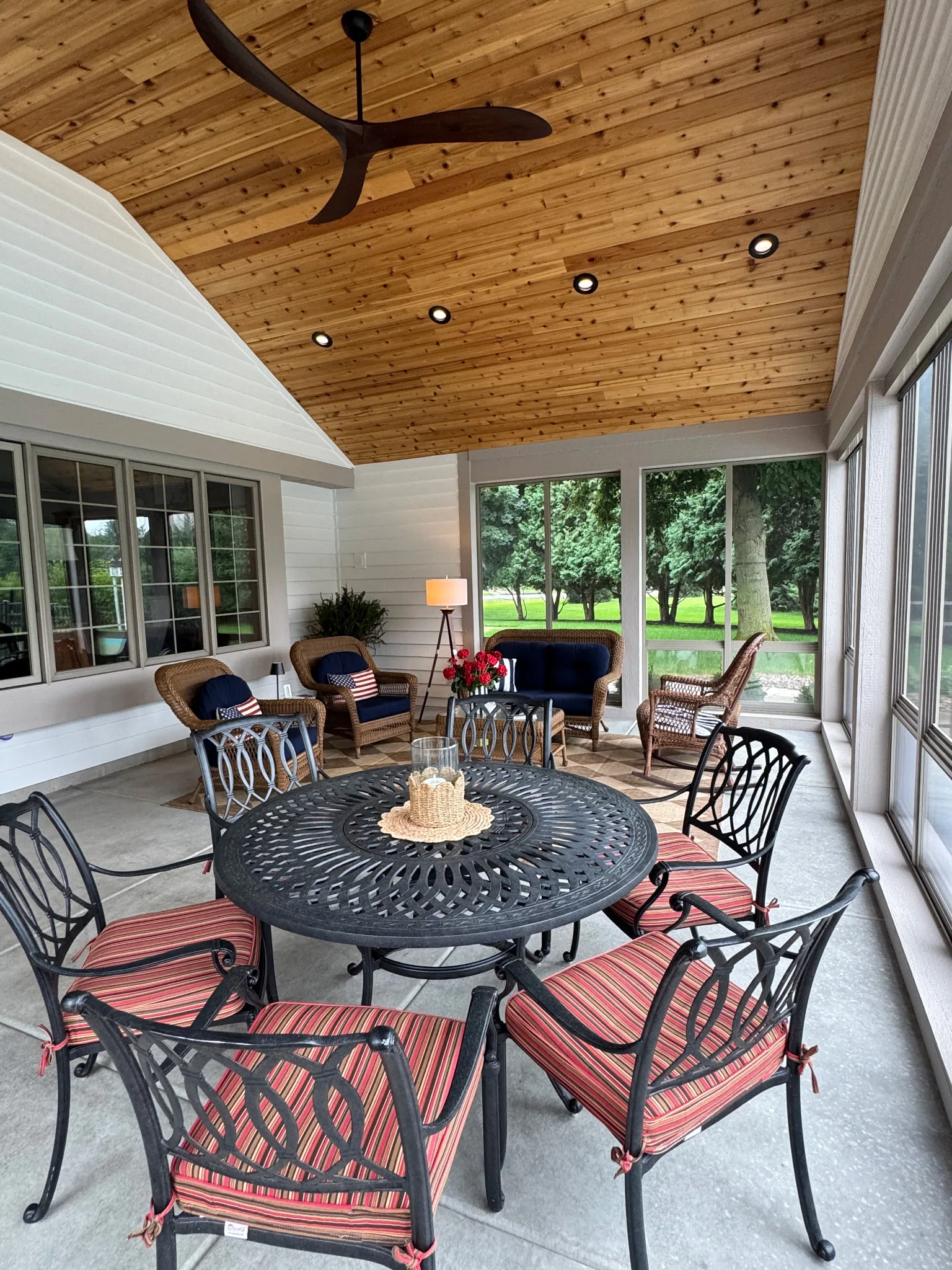 Screened porch interior at dusk